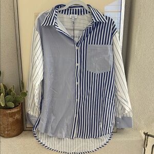 Azura Women’s Blue and White Striped Button Down Shirt, bra, and shorts.